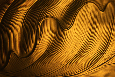 photo of gold-colored abstract artwork thumbnail