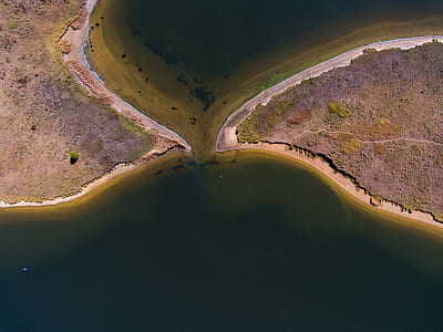 aerial photography of island surrounded by body of water thumbnail