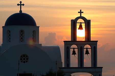 white concrete church with bells thumbnail