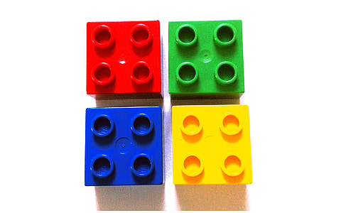 four assorted-color interlocking blocks thumbnail