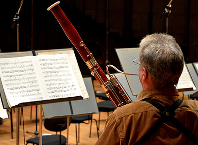 man playing wind instrument thumbnail