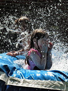 two toddler's on above the ground pool thumbnail