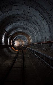 silhouette of person at the end of subway tunnel thumbnail