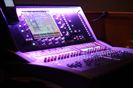 gray and black audio mixer near black microphone thumbnail