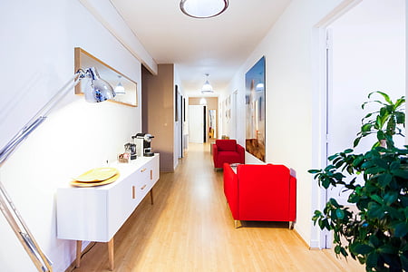 hallway filled with chairs and cabinets thumbnail