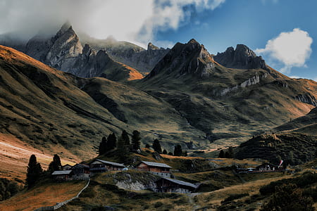 Brown House in Between of Mountains thumbnail