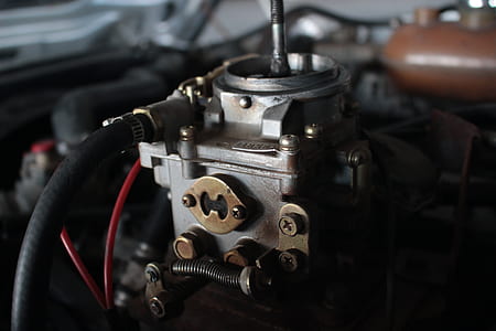 selective focus photography of vehicle engine thumbnail