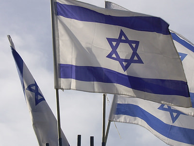 Israel flags during daytime thumbnail
