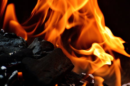 close up photo of charcoal burning thumbnail