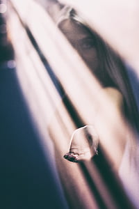 woman covered by sun rays photograph thumbnail
