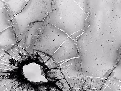 grayscale close up photography of shattered glass thumbnail