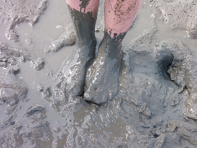person standing on puddle of mud thumbnail