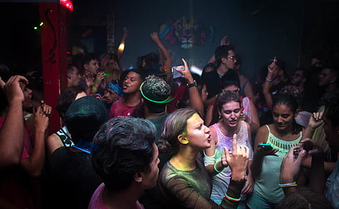 Crowd Dances in Blue Painted Enclosure thumbnail