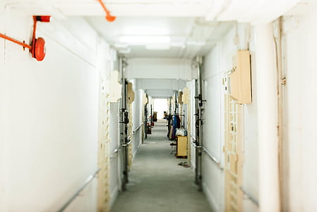 hallway between white walls thumbnail