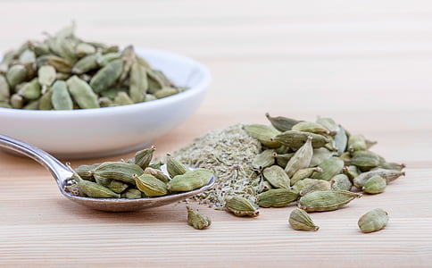 selected focus photo of green seeds on brown surface thumbnail