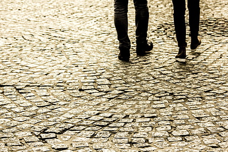 two person walking on ground thumbnail