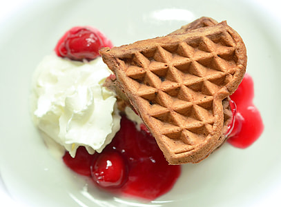 brown waffle and white cream serve on the white plate thumbnail