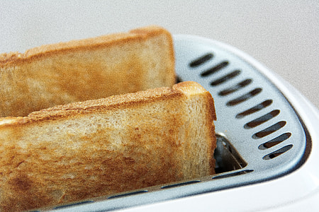 toasted breads in bread toaster thumbnail
