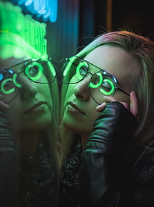 woman holding sunglasses thumbnail
