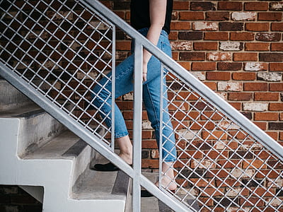 woman going upstairs thumbnail