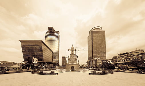 sepia tone photo of high-rise buildings thumbnail