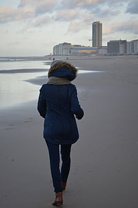 woman standing on seashore thumbnail
