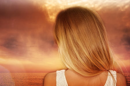 blonde haired person in white tank top thumbnail