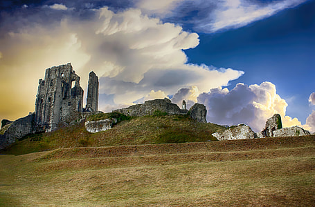 gray concrete ruins under white cloudy sky thumbnail