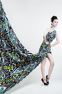 woman wearing white, yellow, and black long dress thumbnail