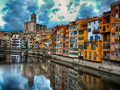 yellow and orange buildings during daytime thumbnail