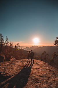 man and woman watching sunrise thumbnail