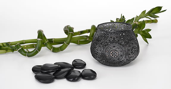 black stones and black vase thumbnail