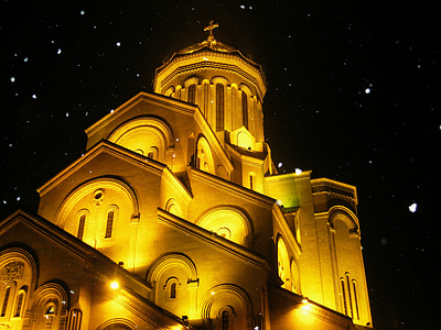 brown church during nighttime thumbnail