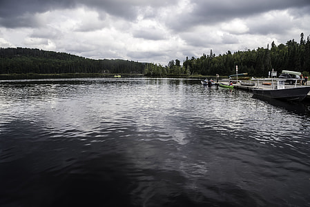 Boats and landscape on the lake in Algonquin Provincial Park, Ontario thumbnail