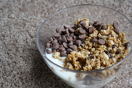 chocolate and cereal with milk served on clear glass bowl thumbnail
