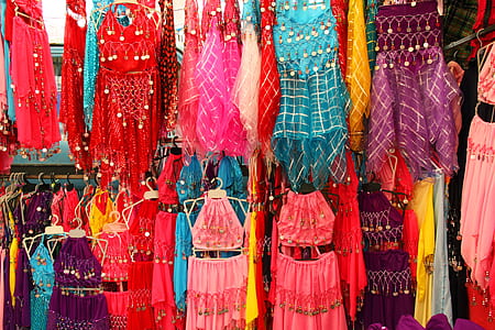 assorted-color-and-print dress lot on clothes hanger thumbnail