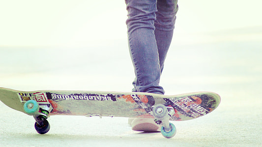 person wearing blue jeans with skateboard thumbnail