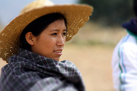 shallow focus photo of woman wearing brown straw hat thumbnail