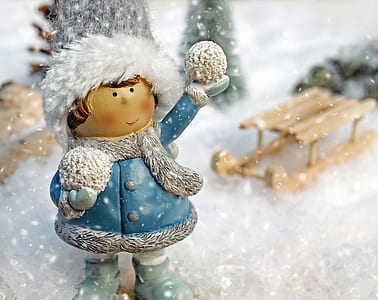 boy figurine focus photo thumbnail