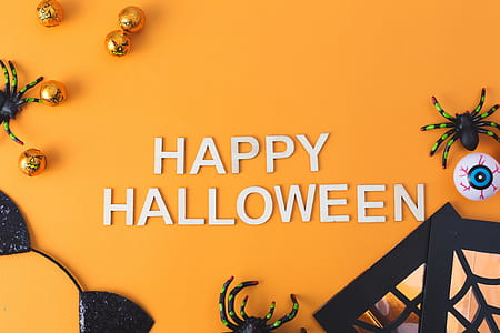Happy Halloween On Orange Flatlay Photo thumbnail