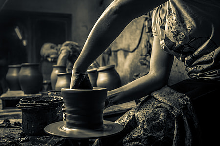 woman forming clay pot thumbnail