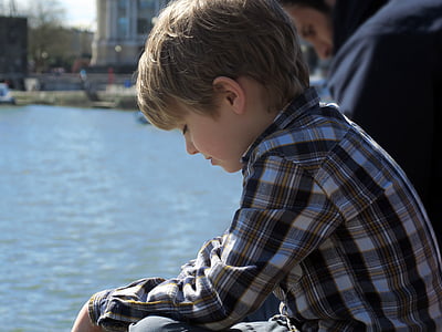 boy wearing white and black plaid sports shirt thumbnail