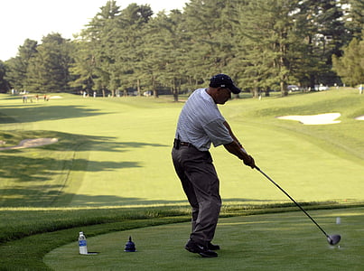 person playing golf on golf course thumbnail