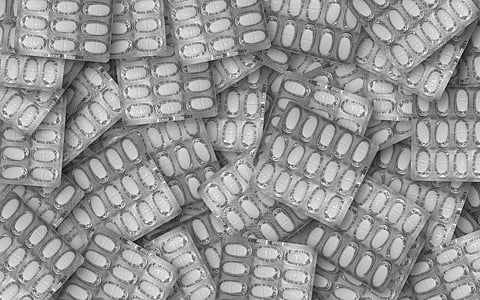 oval white medication pill blister pack lot thumbnail