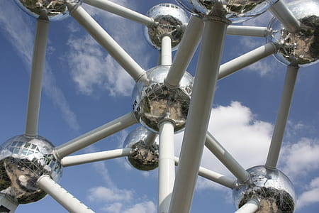 silver-and-white metal structure during daytime thumbnail