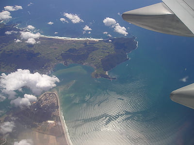 flight of airplane at cloudy daytime thumbnail