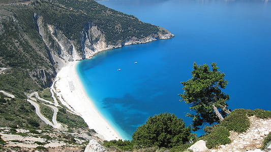 top angle photo of island surrounded by blue ocean water thumbnail