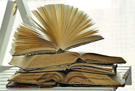 four stack books on table thumbnail