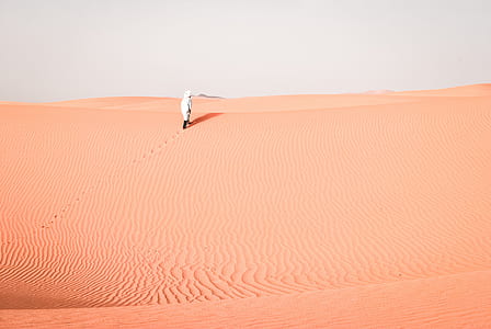 person walking on desert thumbnail