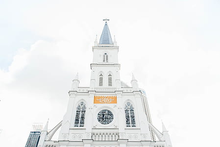 low-angle photography of white and blue cathedral thumbnail